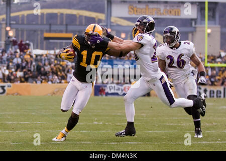 The Baltimore Ravens' Michael Oher walks dejectedly off the field after a  last minute interception by teammate Tom Zbikowski against the Pittsburgh  Steelers was disallowed. The Steelers defeated the Ravens, 23-20, at