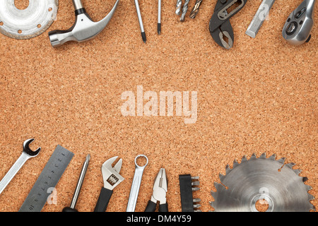 Set of tools on cork panel background with copy space Stock Photo