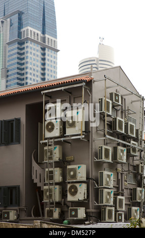 Air conditioning units on the exterior of a building in Chinatown, Singapore. Stock Photo