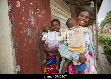 Women with babies in Fenerive Est District, Madagascar. Stock Photo