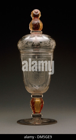 This goblet is a finely crafted drinking vessel featuring detailed ...