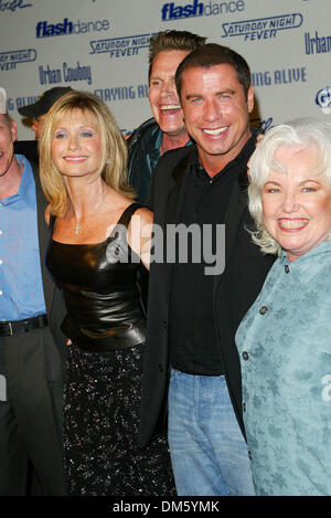 Sept. 24, 2002 - Los Angeles, CALIFORNIA - THE MOVIES THAT DEFINED THEIR GENERATION.GREASE, SATURDAY NIGHT FEVER AND.STAYING ALIVE DVD RELEASE PARTY.ON THE PARAMOUNT STUDIOS BACK LOT IN LOS ANGELES, CA.OLIVIA NEWTON-JOHN, JEFF CONAWAY, JOHN TRAVOLTA.AND JAMIE DONNELLY. FITZROY BARRETT /    9-24-2002              K26327FB         (D)(Credit Image: © Globe Photos/ZUMAPRESS.com) Stock Photo