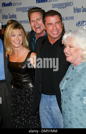 Sept. 24, 2002 - Los Angeles, CALIFORNIA - THE MOVIES THAT DEFINED THEIR GENERATION.GREASE, SATURDAY NIGHT FEVER AND.STAYING ALIVE DVD RELEASE PARTY.ON THE PARAMOUNT STUDIOS BACK LOT IN LOS ANGELES, CA.OLIVIA NEWTON-JOHN, JEFF CONAWAY, JOHN TRAVOLTA.AND JAMIE DONNELLY. FITZROY BARRETT /    9-24-2002              K26327FB         (D)(Credit Image: © Globe Photos/ZUMAPRESS.com) Stock Photo