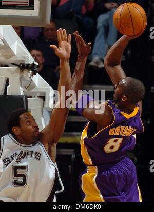 Jan 04, 2005; San Antonio, TX, USA; San Antonio's ROBERT HORRY attempts the block against Los Angeles' Kobe Bryant in the second half at the SBC Center Tuesday night. The Spurs won the game 100-83. Stock Photo