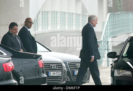 Berlin, Germany. 12th Dec, 2013. Premier of Bavaria Horst Seehofer (R) and SPD Chairman Sigmar Gabriel (L) leave the Federal Chancellery in Berlin, Germany, 12 December 2013. The politicians met for talks with the German Chancellor. Photo: WOLFGANG KUMM/dpa/Alamy Live News Stock Photo