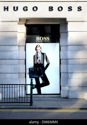 London, England, UK. Hugo Boss shop on Sloane Square. Window display featuring Polish model Anja Rubik Stock Photo