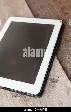 Tablet pc with small cracks on the screen Stock Photo
