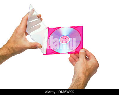 open box with a DVD in the men's hands isolated on white background Stock Photo