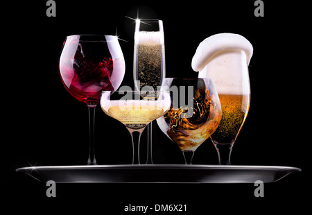 tray with different drinks on black background - champagne, beer, cocktail, wine, brandy, whiskey, scotch, vodka, cognac Stock Photo