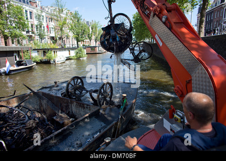 Removing bicycles from the canals in Amsterdam Stock Photo