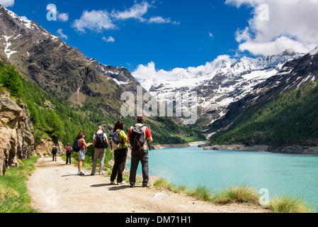 Italy, Valle d'aosta, Valpelline Valley, Walking at the Place Moulin Lake Stock Photo