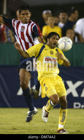 Aug 10, 2005; LOS ANGELES, CALIFORNIA, USA; Over 88,000 fans get ready to watch 'Coors Light Te Trae el Clasico de Clasicos' (Coors Light Brings You the Classic of Classics) between Mexico's two most popular soccer teams the Club Deportivo Chivas del Guadalajara and Club America at the Los Angeles, Memorial Coliseum. Players in action during the game. Club America won the game 2 to Stock Photo