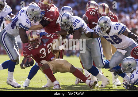 Sep 25, 2005; San Francisco, CA, USA; NFL FOOTBALL: Cowboy receiver Keyshawn  Johnson lunges toward the end zone cone past 49er defender Ahmed Plummer  for a touch down in the 4th quarter