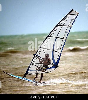 Oct 23, 2005; Key West, FL, USA; Mags and TV Out! Call For Price! 949.481.3747 or (310) 625-2825. Hurricane WILMA: A windsurfer takes advantage of the high winds from hurricane Wilma beginning to swirl around Key West Sunday afternoon. Mandatory Credit: Photo by Damon Higgins/Palm Beach Post/ZUMA Press. (©) Copyright 2005 by Palm Beach Post Stock Photo