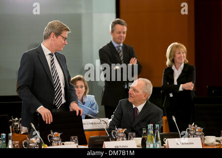 Berlin, Germany. December 12th, 2013. Chancellor Merkel and Interior Minister Friedrich meet with the Prime Ministers of the Germany Federal states at the Chancellery in Berlin. / Picture: Guido Westerwelle, German Foreign Minister, and Wolfgang Schaeuble (CDU), German Finance Minister, Credit:  Reynaldo Chaib Paganelli/Alamy Live News Stock Photo