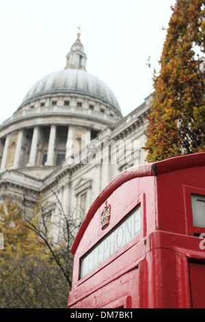 St Paul's Cathedral with part of a typical London red telephone box in the foreground Stock Photo