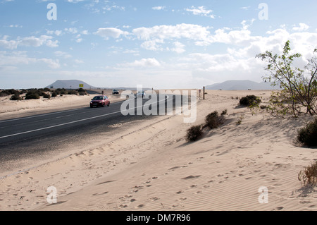 FV1 road passing through the sand dunes, Corralejo, Fuerteventura, Canary Islands, Spain. Stock Photo