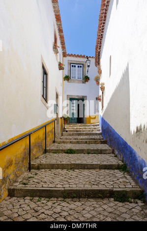 Alley in medieval Óbidos, Portugal, Europe Stock Photo