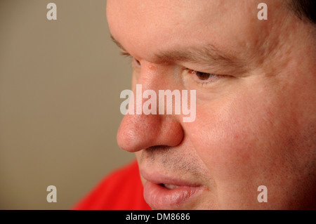 An autistic man lost his job of many years doing data entry with a local police department after he lost funds for a job coach. Stock Photo