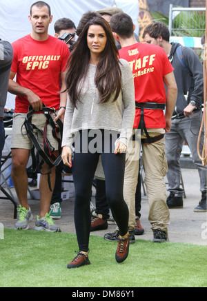 Katie Price aka Jordan Walker's deep ridged crisps - Britain's tallest climbing wall challenge - photocall held at Old Truman Stock Photo