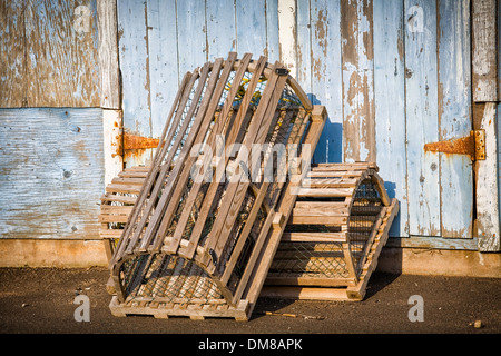 Lobster traps propped up on a wharf in rural Prince Edward Island, Canada. Stock Photo