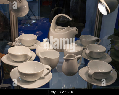 Porcelain tea set on glass showcase Stock Photo