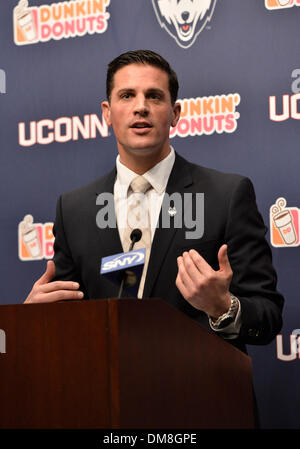 Storrs, CT, USA. 12th Dec, 2013. Thursday December 12, 2013: Bob Diaco talks to the media, at a press conference to announce his hiring as the new UConn Huskies football coach at Shenkman Training Center in Storrs, CT. Bill Shettle / Cal Sport Media. Credit:  csm/Alamy Live News Stock Photo