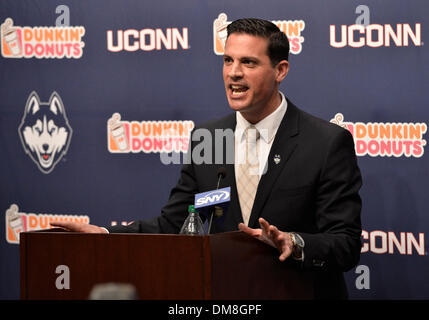 Storrs, CT, USA. 12th Dec, 2013. Thursday December 12, 2013: Bob Diaco talks to the media, at a press conference to announce his hiring as the new UConn Huskies football coach at Shenkman Training Center in Storrs, CT. Bill Shettle / Cal Sport Media. Credit:  csm/Alamy Live News Stock Photo