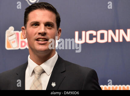 Storrs, CT, USA. 12th Dec, 2013. Thursday December 12, 2013: Bob Diaco talks to the media, at a press conference to announce his hiring as the new UConn Huskies football coach at Shenkman Training Center in Storrs, CT. Bill Shettle / Cal Sport Media. © csm/Alamy Live News Stock Photo