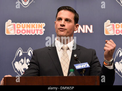 Storrs, CT, USA. 12th Dec, 2013. Thursday December 12, 2013: Bob Diaco talks to the media at a press conference to announce his hiring as the new UConn Huskies football coach at Shenkman Training Center in Storrs, CT. Bill Shettle / Cal Sport Media. Credit:  csm/Alamy Live News Stock Photo