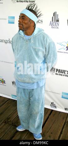 Nov. 10, 2002 - Santa Monica, CALIFORNIA, USA - COOLIO ..K27108MR  INTERNATIONAL DAY OF THE CHILD HOSTS OVER 2000 AT-RISK CHILDREN .SANTA MONICA PIER, SANTA MONICA, CA.NOV. 10, 2002. MILAN RYBA/   2002.(Credit Image: © Globe Photos/ZUMAPRESS.com) Stock Photo