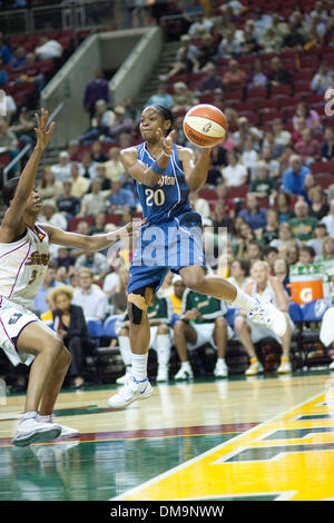 25 August 2009: Alana Beard (20) saves a ball going out of bounds during the Seattle Storm 78-68 victory over the Washington Mystics at Key Arena in Seattle Washington. (Credit Image: © Southcreek Global/ZUMApress.com) Stock Photo