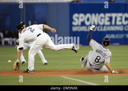 Tampa Bay Rays designated hitter Pat Burrell (L) homered and congratulates  teammate Gabe Kapler (R) after he scored against the Toronto Blue Jays at  the Rogers Centre in Toronto, ON. The Blue