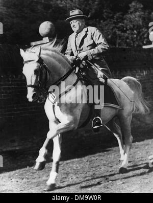 Nov. 30, 1964 - Westerham, Kent, U.K. - SIR WINSTON CHURCHILL wanted to celebrate his 90th birthday riding horses so he wrote 'It is Better to give one's son a horse than money' and MR. Jan Van Leer wrote back that he'd be delighted to bring his horses, so he took them to Chartwell. PICTURED: Churchill riding the horse 'Salve' around the grounds of Chartwell. (Credit Image: © KEYST Stock Photo