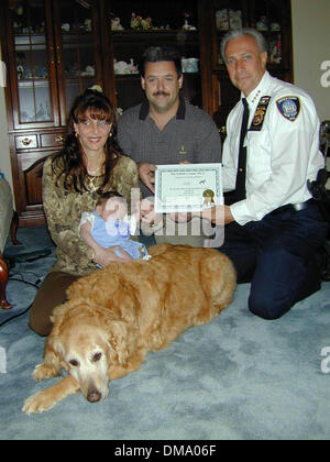 May 20, 2002 - Bellport, Long Island - 5/20/02 Bellport, New York Five week old Troy Joseph Sica owes his life to 15 year old ''Bullet'' the familys aging Golden Retriever who allerted Troy's mom Pam, with loud barking & running back and forth when the youngster was gasping for air & stopped breathing. Mom called the medics & baby Troy was rushed to Brookhaven Hospital where he was Stock Photo