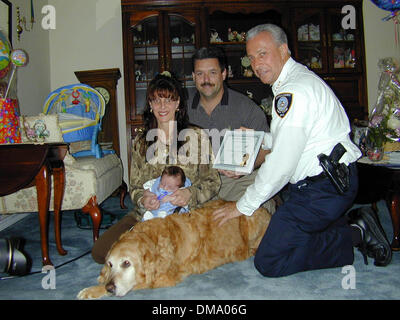 May 20, 2002 - Bellport, Long Island - 5/20/02 Bellport, New York Five week old Troy Joseph Sica owes his life to 15 year old ''Bullet'' the familys aging Golden Retriever who allerted Troy's mom Pam, with loud barking & running back and forth when the youngster was gasping for air & stopped breathing. Mom called the medics & baby Troy was rushed to Brookhaven Hospital where he was Stock Photo