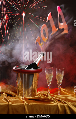 pouring champagne and fireworks on a dark background Stock Photo