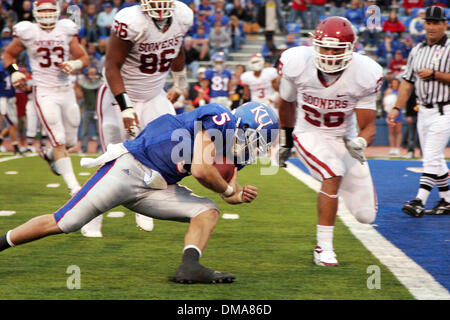 Todd Reesing #5 of the Kansas Jayhawks dives into the end zone for a ...