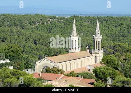 View of Church & Gothic Spires of Frigolet Abbey or Abbaye de St-Michel de Frigolet near Tarascon in Forest Setting Montagnette Provence France Stock Photo