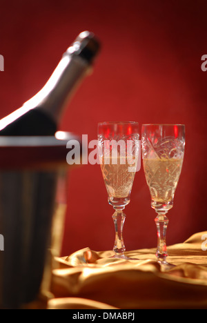 pouring champagne and fireworks on a dark background Stock Photo