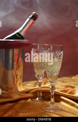 pouring champagne and fireworks on a dark background Stock Photo