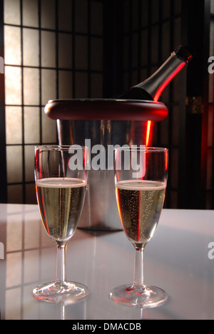 pouring champagne and fireworks on a dark background Stock Photo