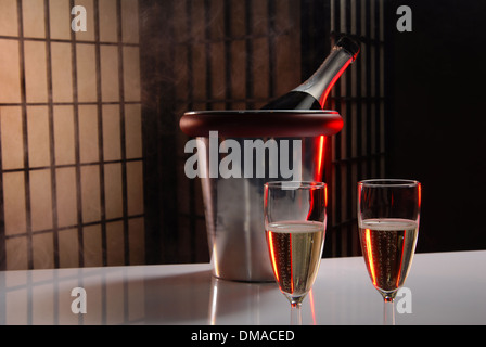 pouring champagne and fireworks on a dark background Stock Photo