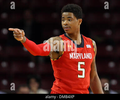 Chestnut Hill, Massachusetts, USA. 13th Dec, 2013. December 12, 2013; Maryland Terrapins guard Nick Faust (5) points to a teammate during the NCAA basketball game between the Boston College Eagles and Maryland Terrapins at Conte Forum. Maryland defeated Boston College 88-80. Anthony Nesmith/CSM/Alamy Live News Stock Photo