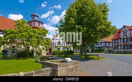 Village green with church in Altenburschla, Wanfried, Werra-Meissner district, Hesse, Germany Stock Photo