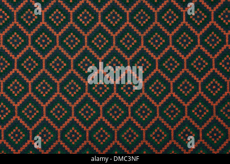 Material in geometric patterns, a colored textile background. Stock Photo