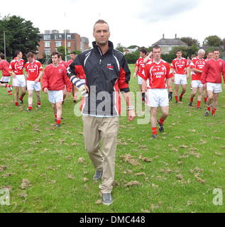 Callum Best Callum Best and Paddy Doherty film scenes  RTE's Celebrity Bainisteoir at Clontarf GAA Club where Callum's team Stock Photo