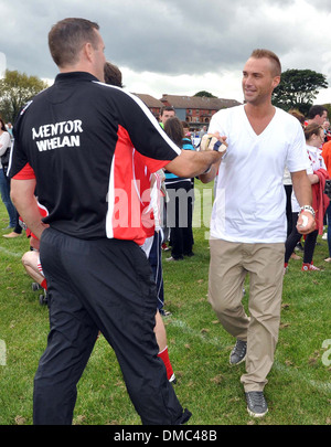 Callum Best Callum Best and Paddy Doherty film scenes  RTE's Celebrity Bainisteoir at Clontarf GAA Club where Callum's team Stock Photo