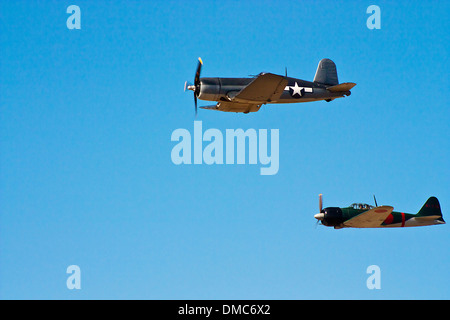 An F-4U Corsair and a Mitsubishi  A6m doing a flyby at the Wings over Camarillo Air Show In Camarillo California Stock Photo