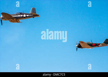 An F-4U Corsair and a Mitsubishi  A6m doing a flyby at the Wings over Camarillo Air Show In Camarillo California Stock Photo